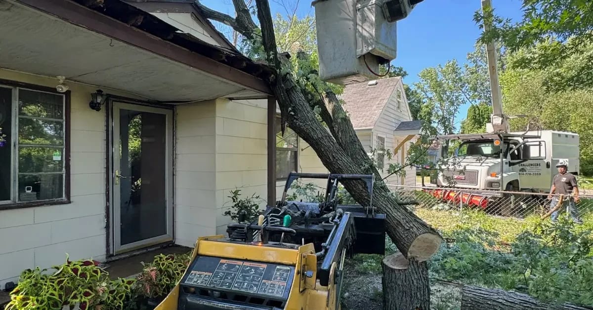 Fallen tree on home after storm in Dublin, OH requiring emergency tree service